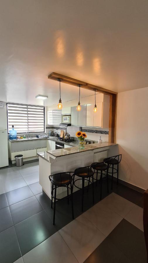Elegante Apartamento Con Vistas Al Volcan Tungurahua Baños Exterior foto